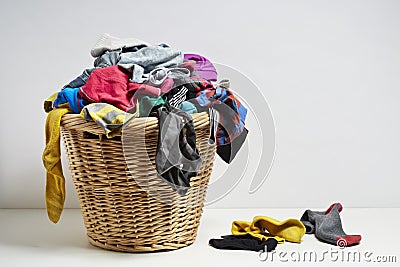 Overflowing laundry basket Stock Photo