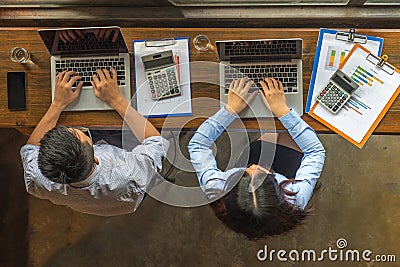 Overhead Business Angle: Asian business people using laptop and working Stock Photo