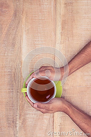 Overhead of businessman holding coffee Stock Photo