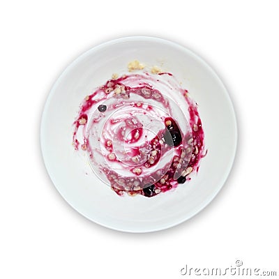 An overhead photo of dirty bowl with the oatmeal porridge and bilberry jam leftovers. Isolated on white. Messthetics aesthetic con Stock Photo