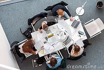 Overhead picture of students studying in coworking space Editorial Stock Photo