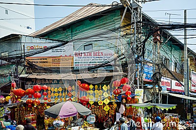 Overhead power cables pose a threat to the residents of Saigon Editorial Stock Photo