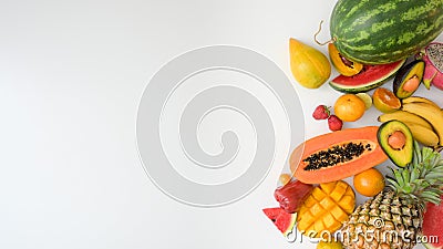 Overhead shot of assortment of exotic fruits and copy space on white background Stock Photo