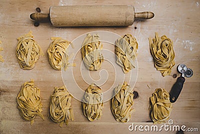 Overhead shot of rows of freshly made pasta. Stock Photo
