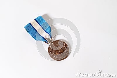 Overhead shot of United Nations Peacekeeper`s medal Editorial Stock Photo