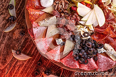 Overhead shot of a variety of meat assortment on a wooden surface Stock Photo