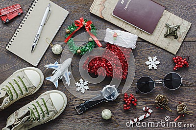 Overhead view of accessory Merry Christmas with items to travel background concept. Stock Photo