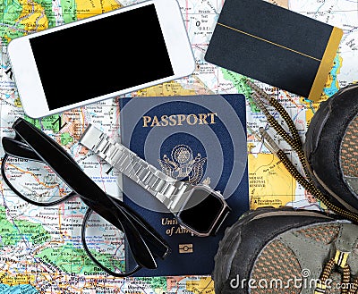 Overhead view of basic travel objects on map Stock Photo