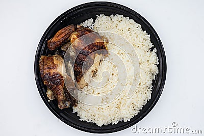 Bowl of Delicious Peruvian Chicken with Rice on a White Background Stock Photo