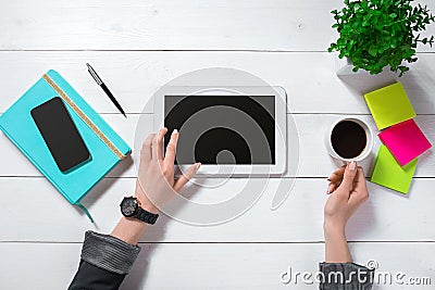 Overhead view of businesswoman working at computer in office Stock Photo