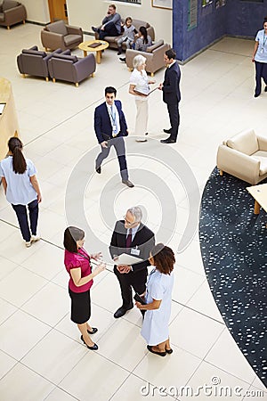Overhead View Of Busy Hospital Reception Stock Photo