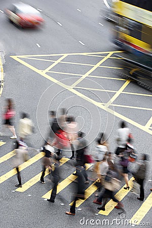 Overhead View Of Commuters Crossing Busy Street Stock Photo