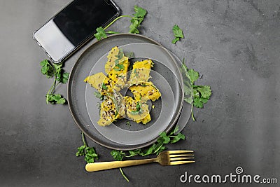 Overhead view of Dhokla, an Indian Gujarati snack which is vegetarian Stock Photo