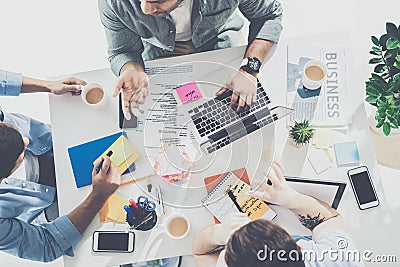 overhead view of focused young businessmen working on new project together business Stock Photo