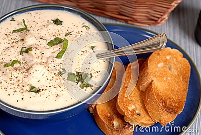 Overhead view of New England Chowder in a blue bowl Stock Photo