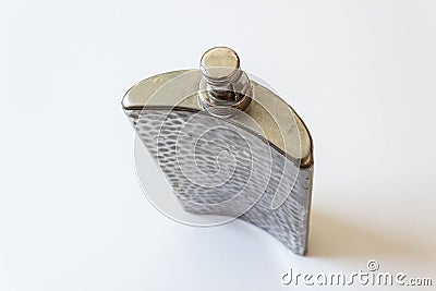Overhead view of old metal flask, top closed, drinking alcoholism addiction concept Stock Photo