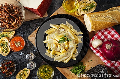 overhead view of plate of macaroni with meat and mix of vegetables Stock Photo