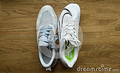 Overhead view professional running shoes manufactured by Nike comparing two Editorial Stock Photo