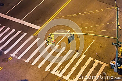 Overhead view of street intersection at night in NYC Stock Photo