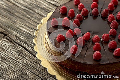 Overhead view of tasty raw chocolate cake decorated with raspber Stock Photo