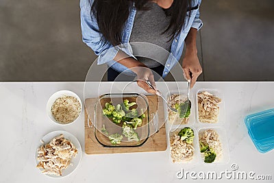 Overhead View Of Woman In Kitchen Preparing High Protein Meal Stock Photo