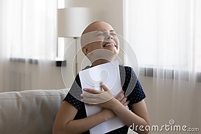 Overjoyed female cancer patient excited with remission Stock Photo