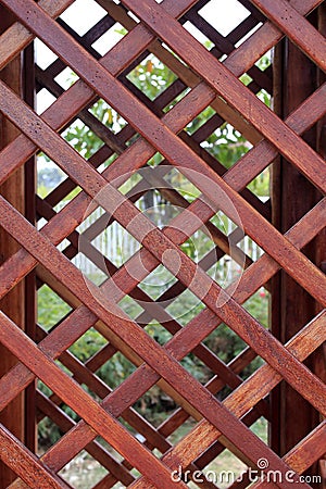 Overlapping brown wooden lattice Stock Photo