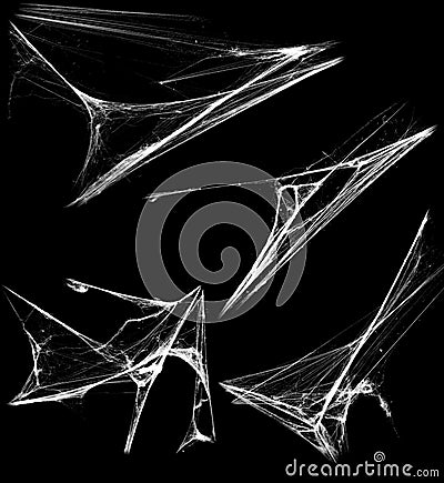 Overlay the cobweb effect. A collection of spider webs isolated on a black background. Spider web elements as decoration to the de Stock Photo