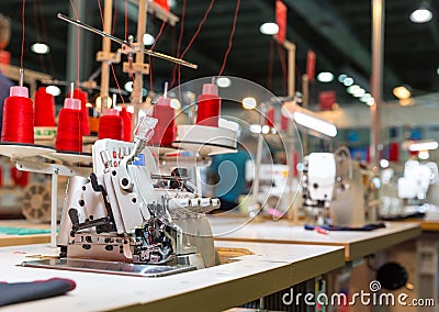 Overlock machine on sewing factory, nobody Stock Photo