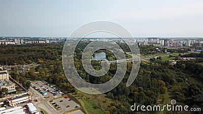 An overpass across the city river. Busy freeway. Aerial photography Stock Photo