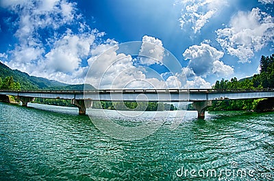 Overpass freeway bridge spans across a lake Stock Photo