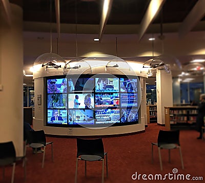Oversized television screen inside Toronto Reference public library Editorial Stock Photo