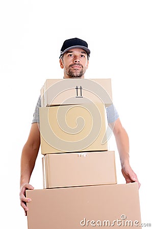 Overstrained postman with parcels Stock Photo