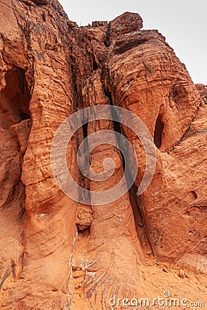 Double deep cracks in red rock wall, Valley of Fire, Nevada, USA Stock Photo