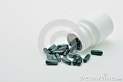 Overturned medicine bottle Stock Photo