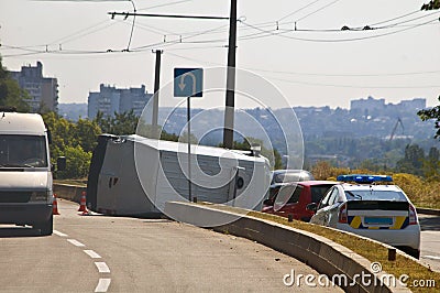 Overturned transport on accident site with traffic cones Stock Photo