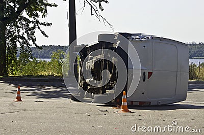 Overturned transport on accident site with traffic cones Stock Photo