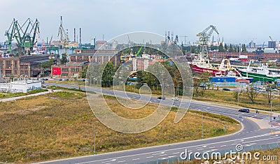 Overview of the city Gdansk and the heavy cranes of the Shipyard. Editorial Stock Photo
