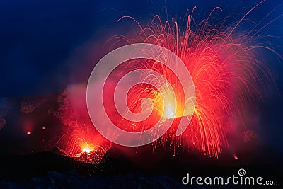 Strombolian Eruption from Stromboli volcano with Lava trails explosion Stock Photo