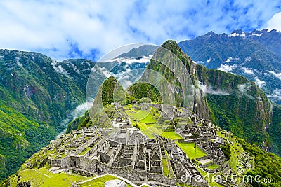 Overview of Machu Picchu, agriculture terraces and Wayna Picchu peak in the background Stock Photo