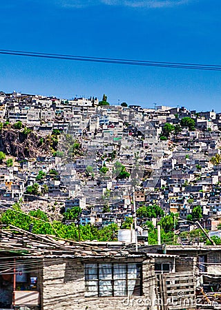 overview of a shanty town on a hill Mexico city Editorial Stock Photo