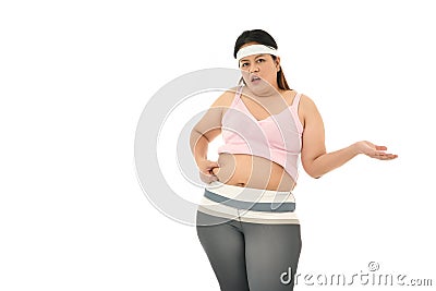 Overweight Asian woman pinching belly fat isolated on white background Stock Photo