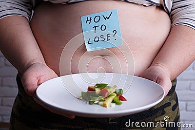 Overweight fat woman with a little portion of food asking how to Stock Photo