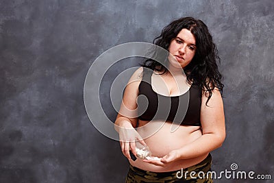 Overweight fat woman taking slimming pills. Weight loosing, diet Stock Photo