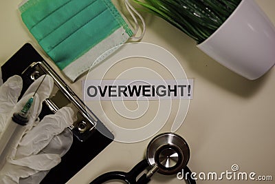 Overweight with inspiration and healthcare/medical concept on desk background Stock Photo