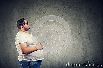 Overweight man with big belly Stock Photo