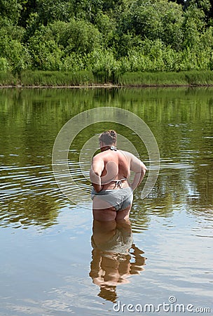 Overweight woman bath Stock Photo