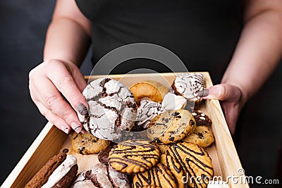 Overweight woman eating fattening sweets Stock Photo