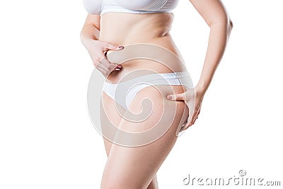 Overweight woman with flabby belly and fat hips, obesity female body isolated on white background Stock Photo