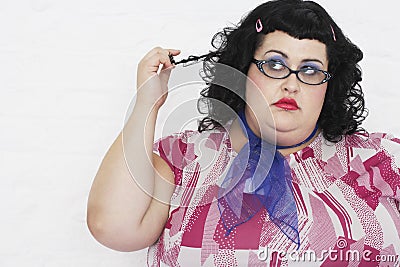 Overweight Woman Twisting Strand Of Hair Stock Photo